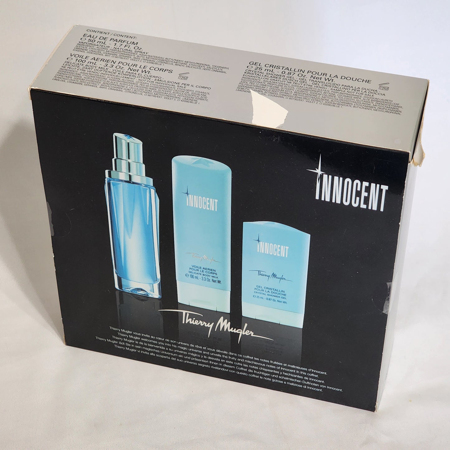 ANGEL INNOCENT by Thierry Mugler , EAU DE PARFUM SPRAY 1.7 OZ & BODY MILK 3.3 OZ & SHOWER GEL 0.8 OZ - vintage