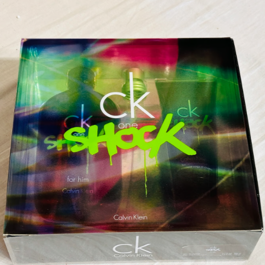 CK One Shock by Calvin Klein for Men 2 Piece Set Includes: 6.7 oz Eau de Toilette Spray + 3.4 oz Body Wash